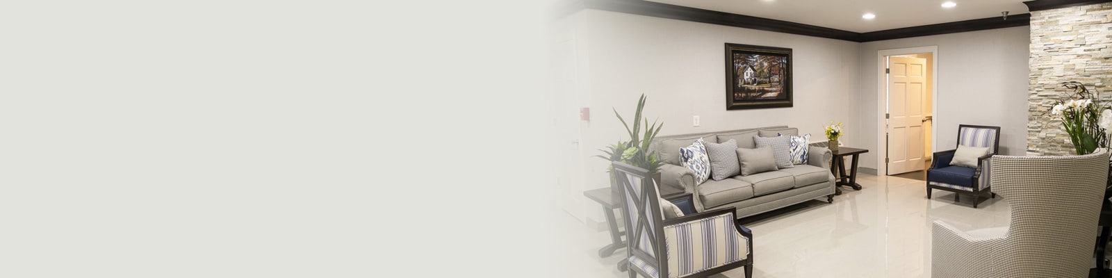 A lobby with couches and chairs at Homestead